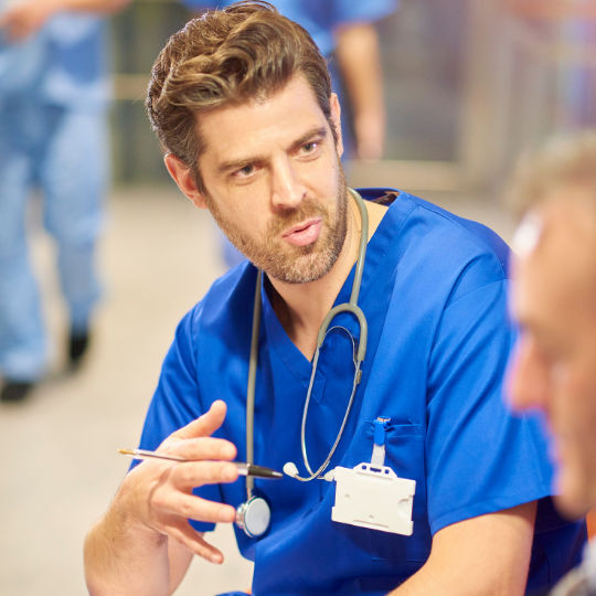 Doctor talking to patient